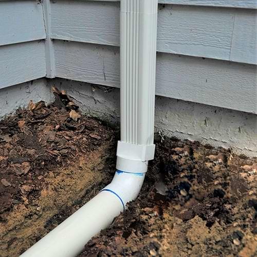 Gutter Shutter of the Triangle installs gutter downspout extensions in Durham, Raleigh, Chapel Hill